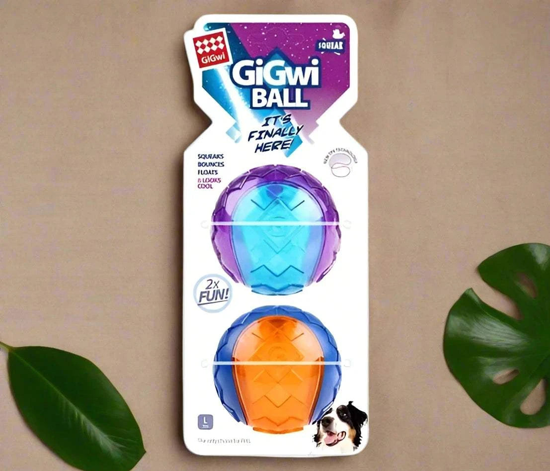 GiGwi Original Fetch Ball for dogs, featuring a durable Thermoplastic Rubber (TPR) construction, bright colorful design, and an internal squeaker. The ball is shown floating in water, highlighting its versatility for both land and water play.