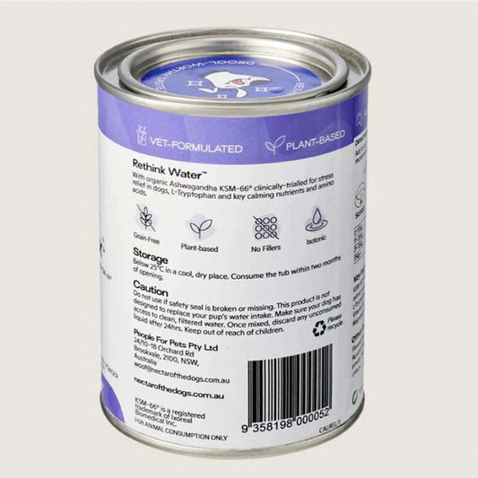 Nectar of the Dogs Calm + Relax Soluble Powder for dogs, featuring a sleek container with a label showcasing its plant-based, organic ingredients. The powder is designed to support canine immune health, relaxation, and hydration, with a savory Aussie BBQ sausage flavor.storage,caution,plant base