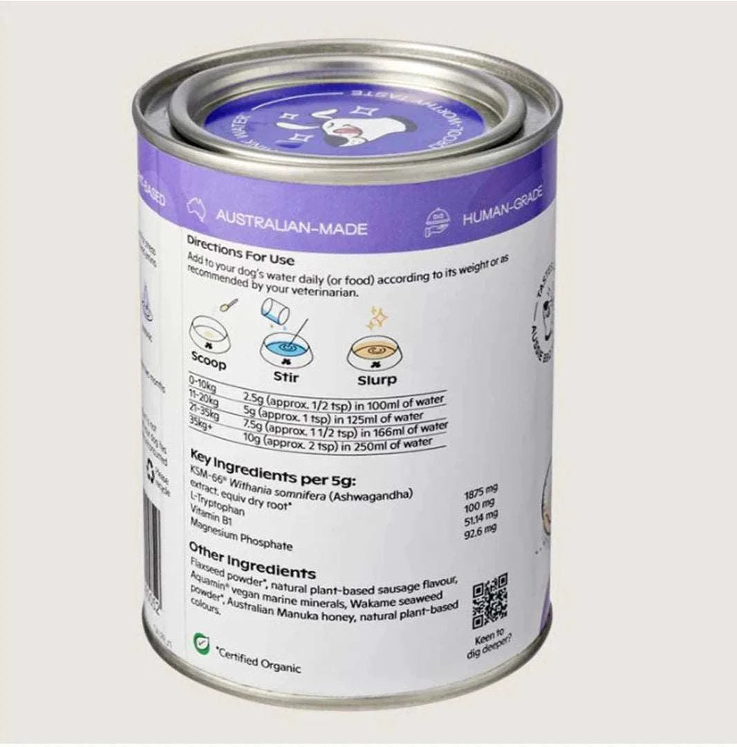 Nectar of the Dogs Calm + Relax Soluble Powder for dogs, featuring a sleek container with a label showcasing its plant-based, organic ingredients. The powder is designed to support canine immune health, relaxation, and hydration, with a savory Aussie BBQ sausage flavor.