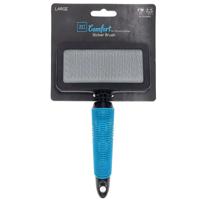 Grooming a dog with the ZEEZ Comfort Slicker Brush to remove loose fur.